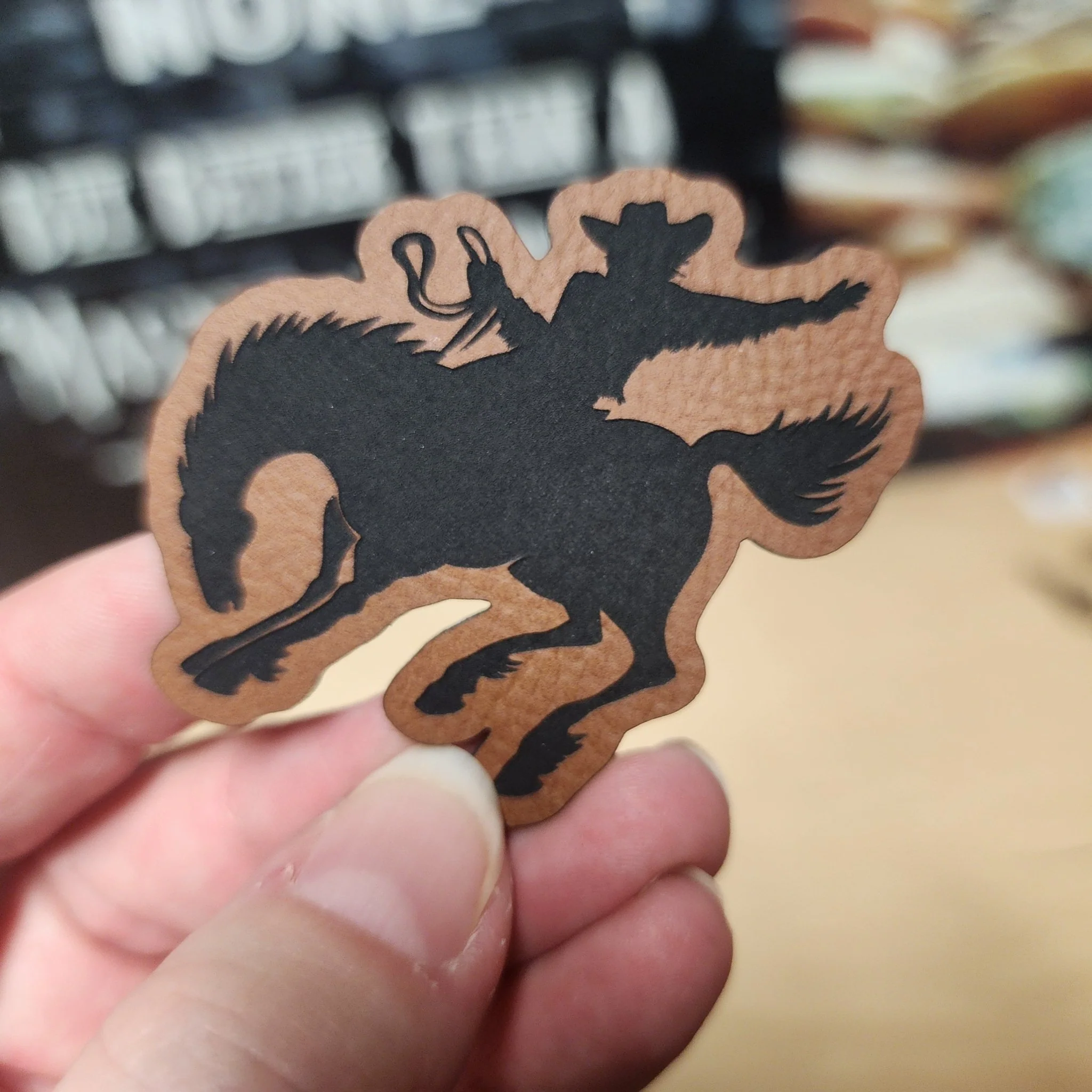 Cowboy Riding Bronco (Rawhide) Engraved Leatherette Hat Patch - MR01